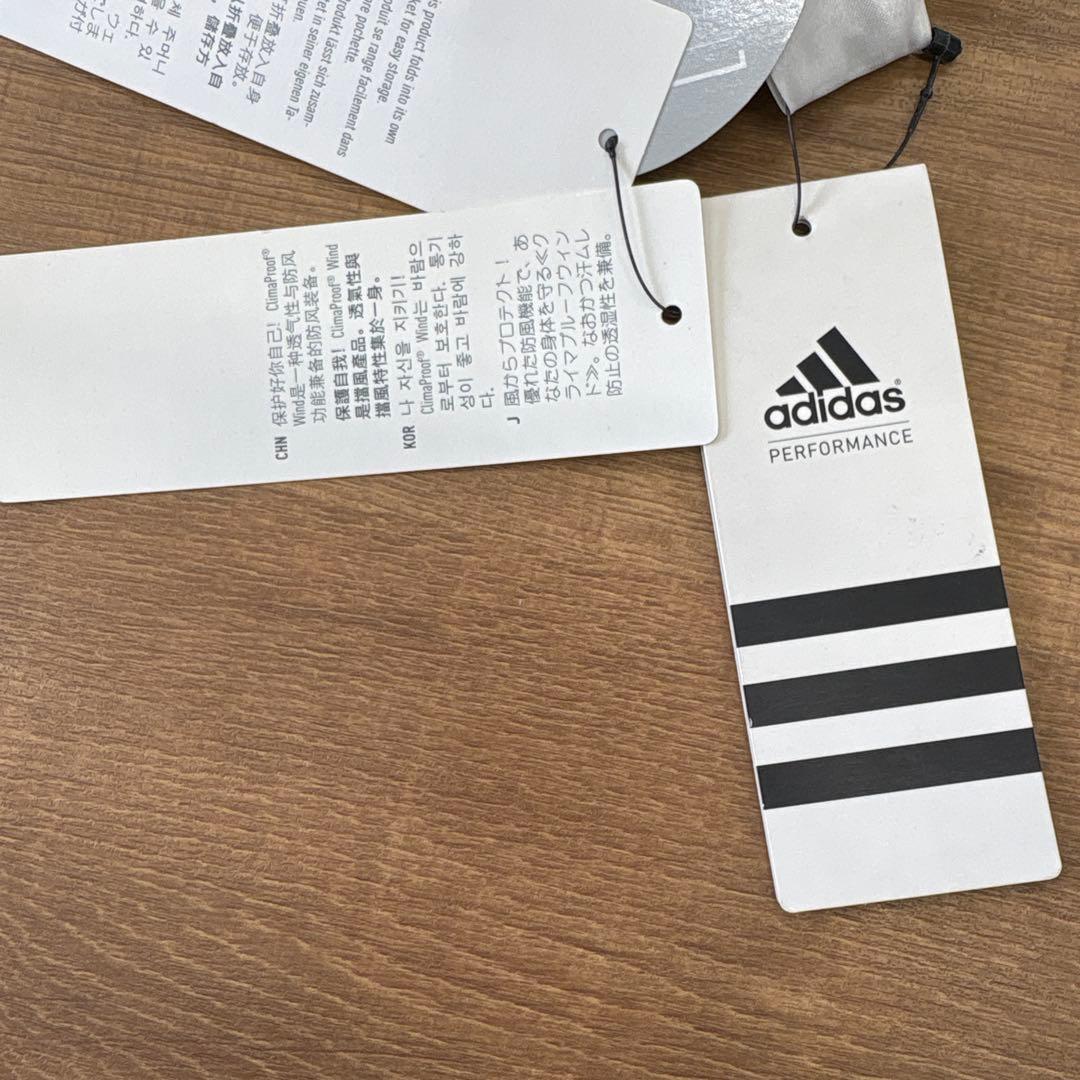 adidas ウィンドブレーカー レディース　水色