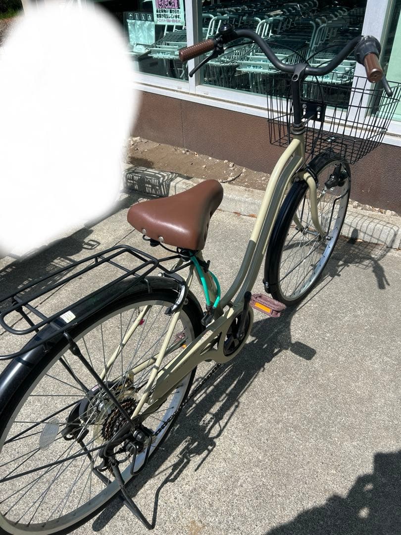 クリーム色のシティサイクル