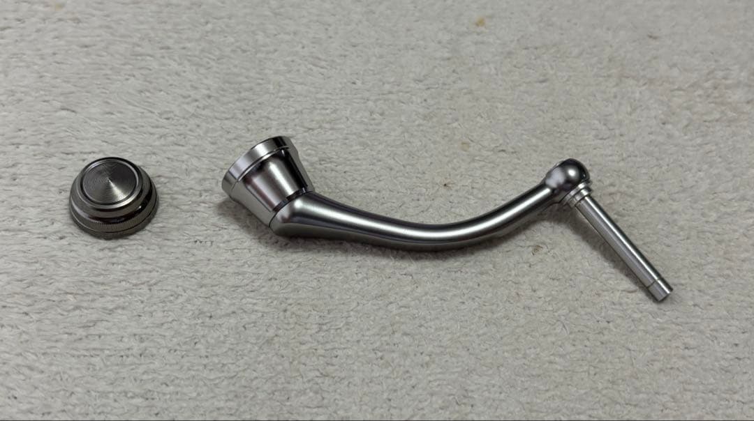 50mmハンドル　ハンドルキャップ　24セルテート純正　ダイワ