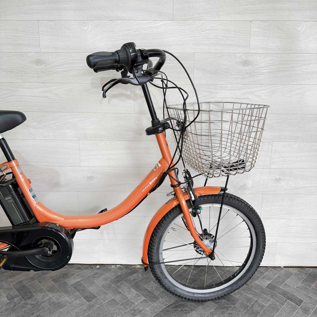 オレンジ 電動アシスト自転車 シティタイプ