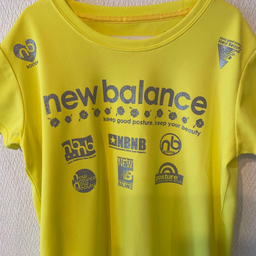ホノルルマラソン限定　ハイビスカスnew balance イエロー トップス