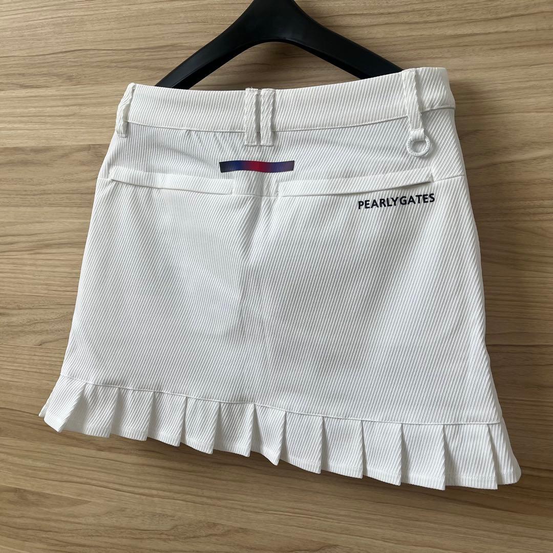 新品★28,600円 パーリーゲイツ 裾プリーツスカート 春夏ホワイトスカート0