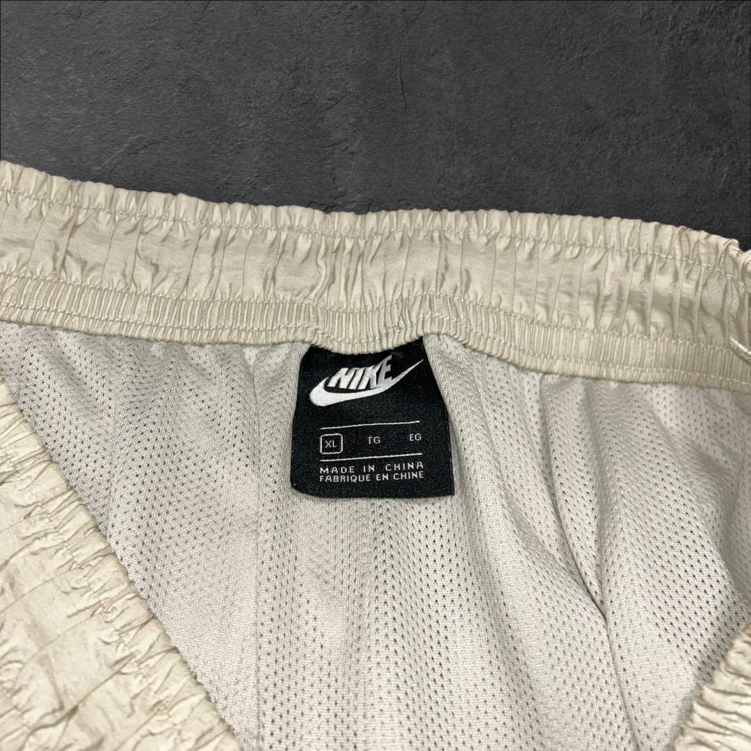 NIKE ダブルスウッシュ刺繍ロゴ テックウィンドパンツ ナイロンパンツ