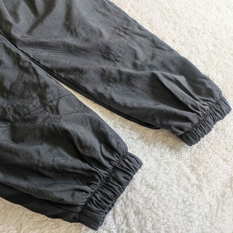 新品 NIKE ナイキ ナイロンウーブンパンツ 裏起毛