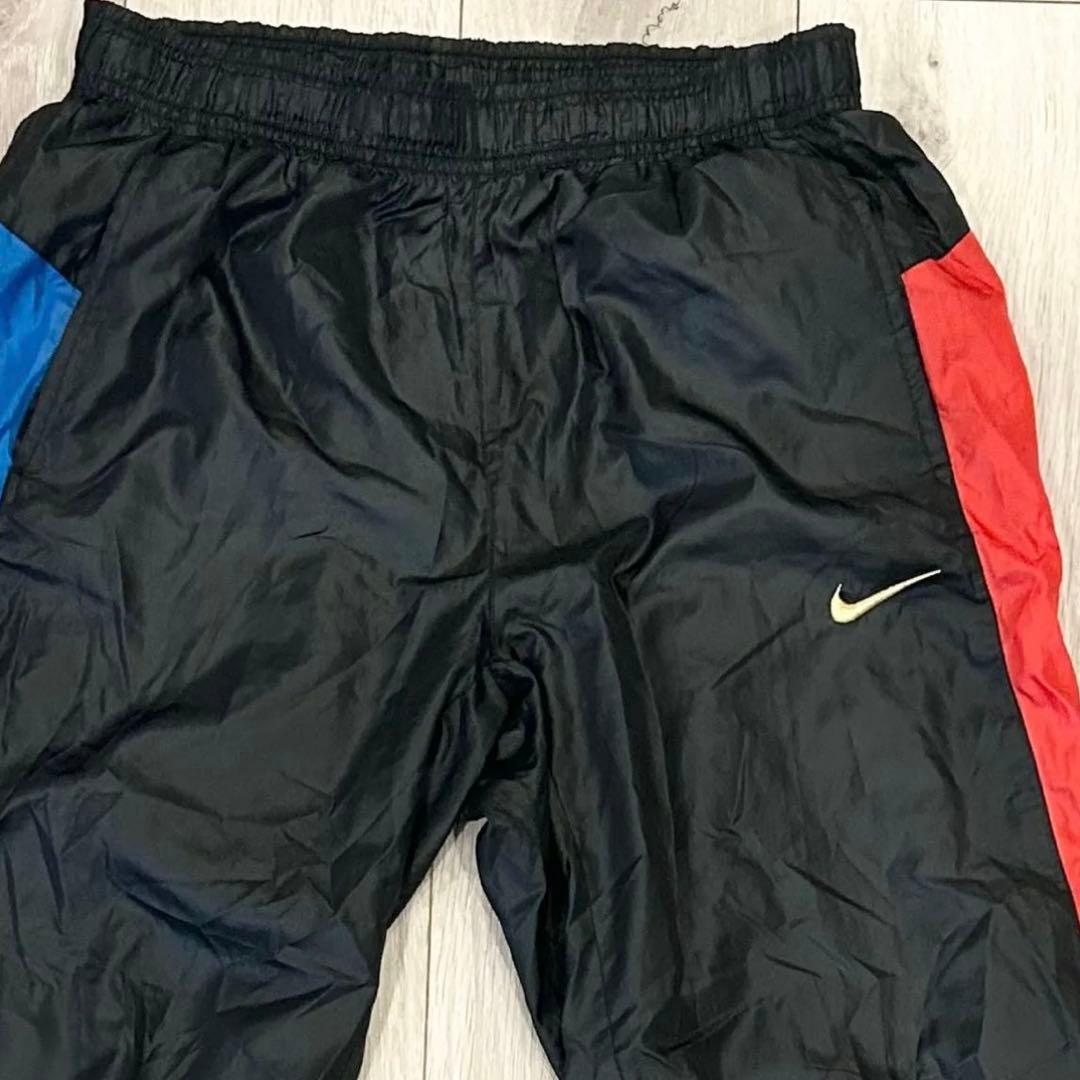 希少デザイン・美品　NIKE ナイロンパンツ トラックパンツ マルチカラー　L