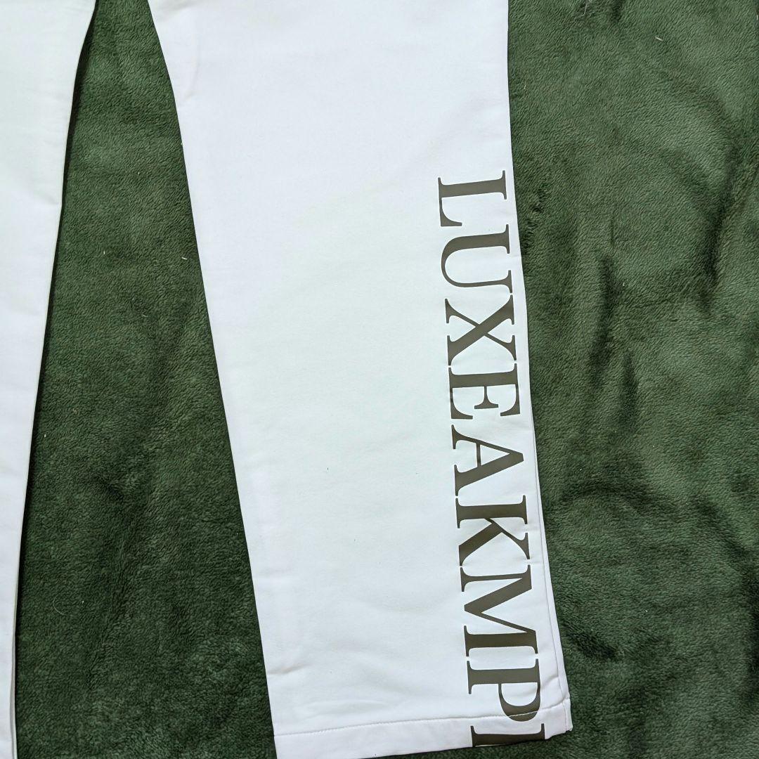 【新品】LUXEAKMPLUS 防風ヘムロゴストレッチロングパンツXLサイズ