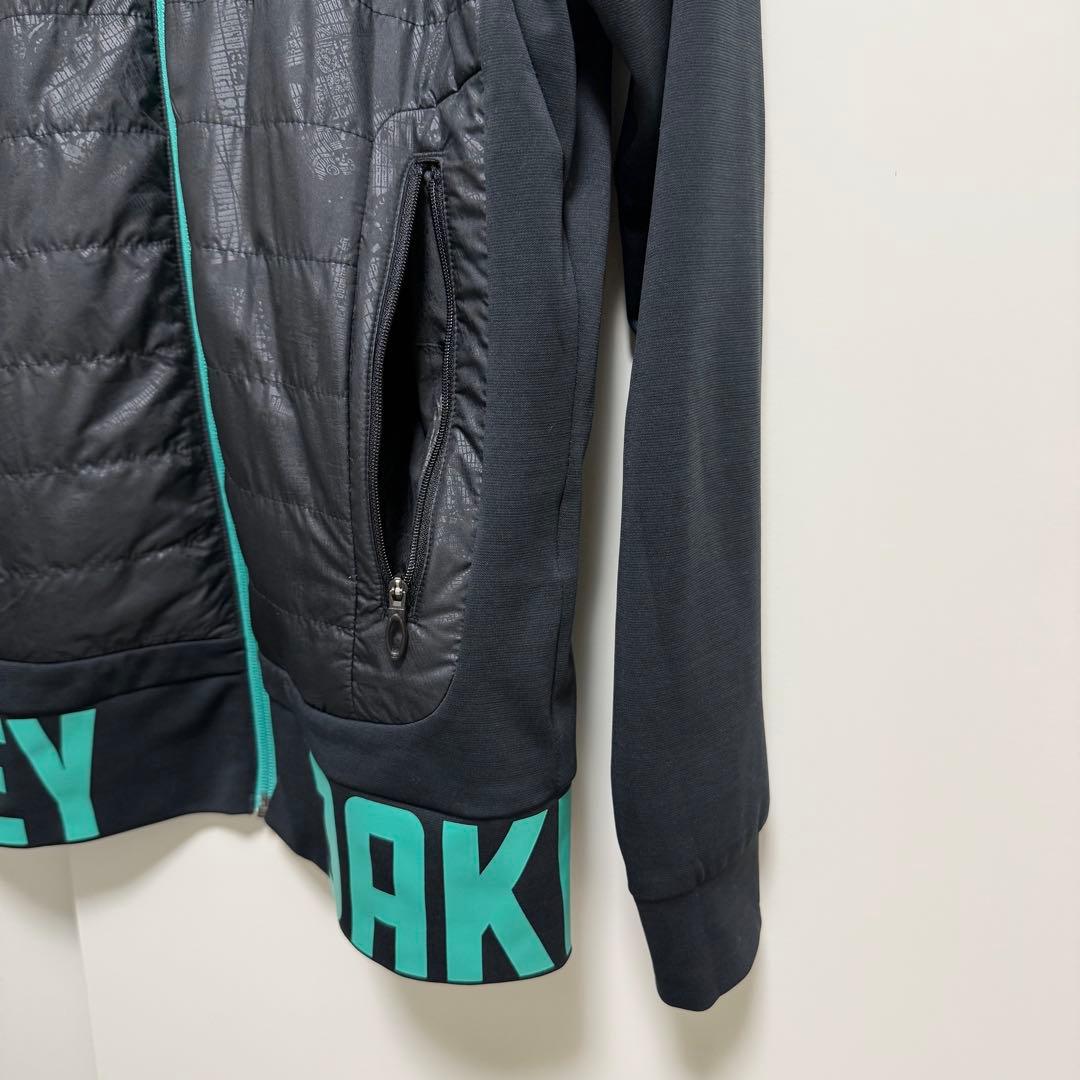 超美品 OAKLEY オークリー 中綿切替 ゴルフウェア ジャケット M