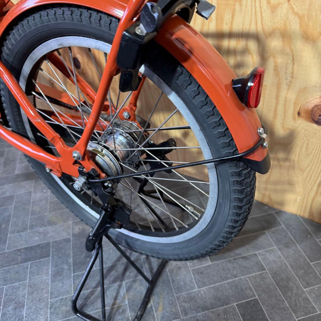 オレンジ色 電動アシスト自転車 シティタイプ
