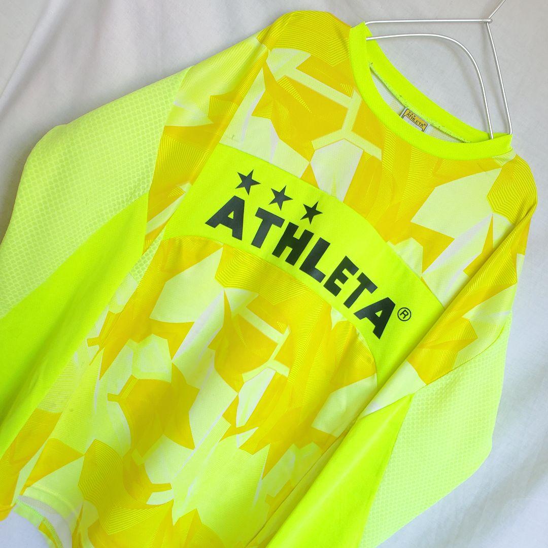 ATHLETA ネオンイエロー 長袖 ウェア ロンT 模様 柄 サッカー