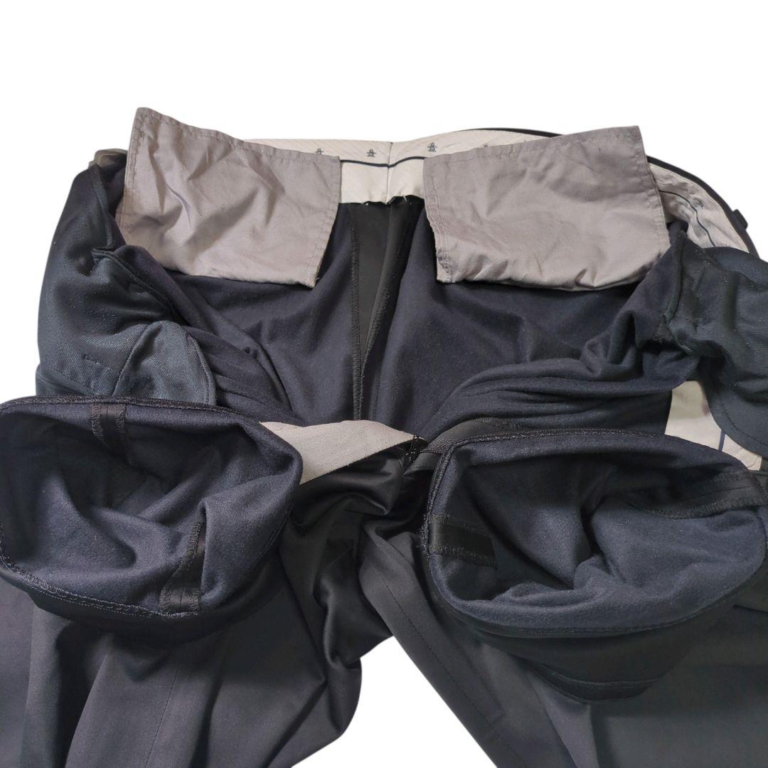 良品 マンシングウェア Munsingwear スラックス 100 黒 蓄熱