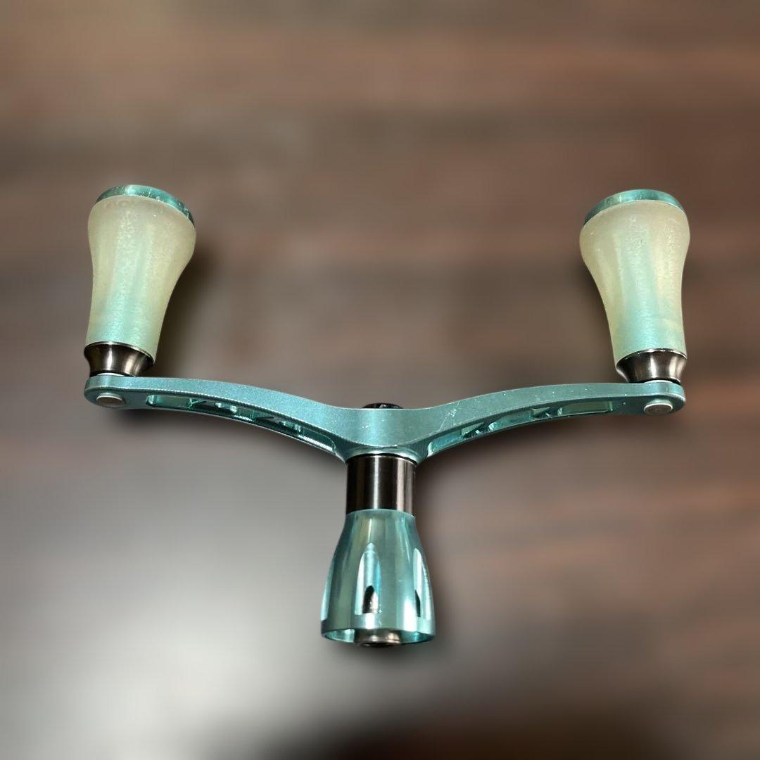 ゴメクサス CY98ダイワ用スピニングリール ダブルハンドル エメラルダスカラー