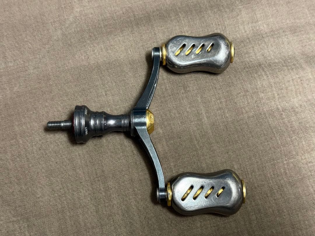 スピニングリールハンドル メタル シルバー/ゴールド　シマノ72mm