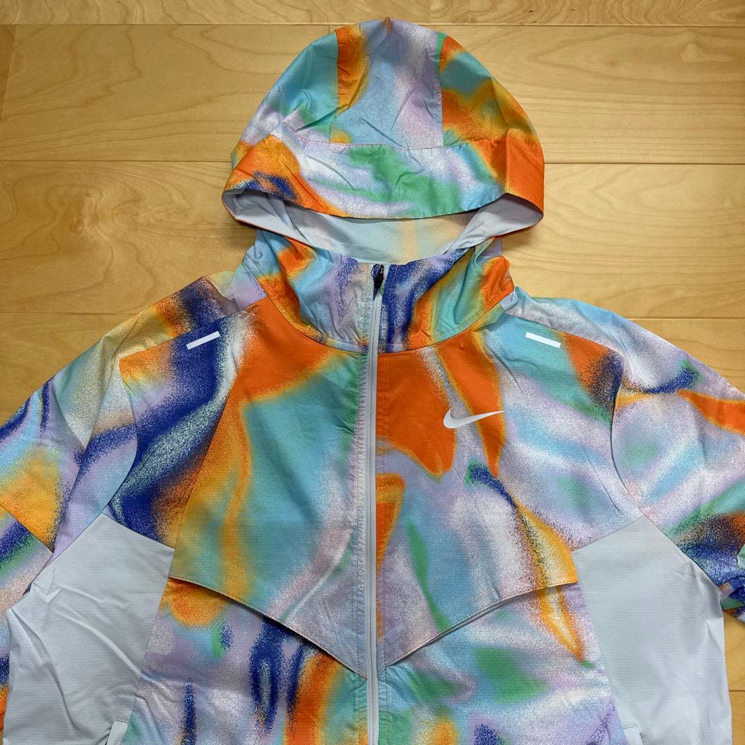 NIKE ランニングウェア　ウィンドランナー　フルジップ　上着　総柄　L 新品