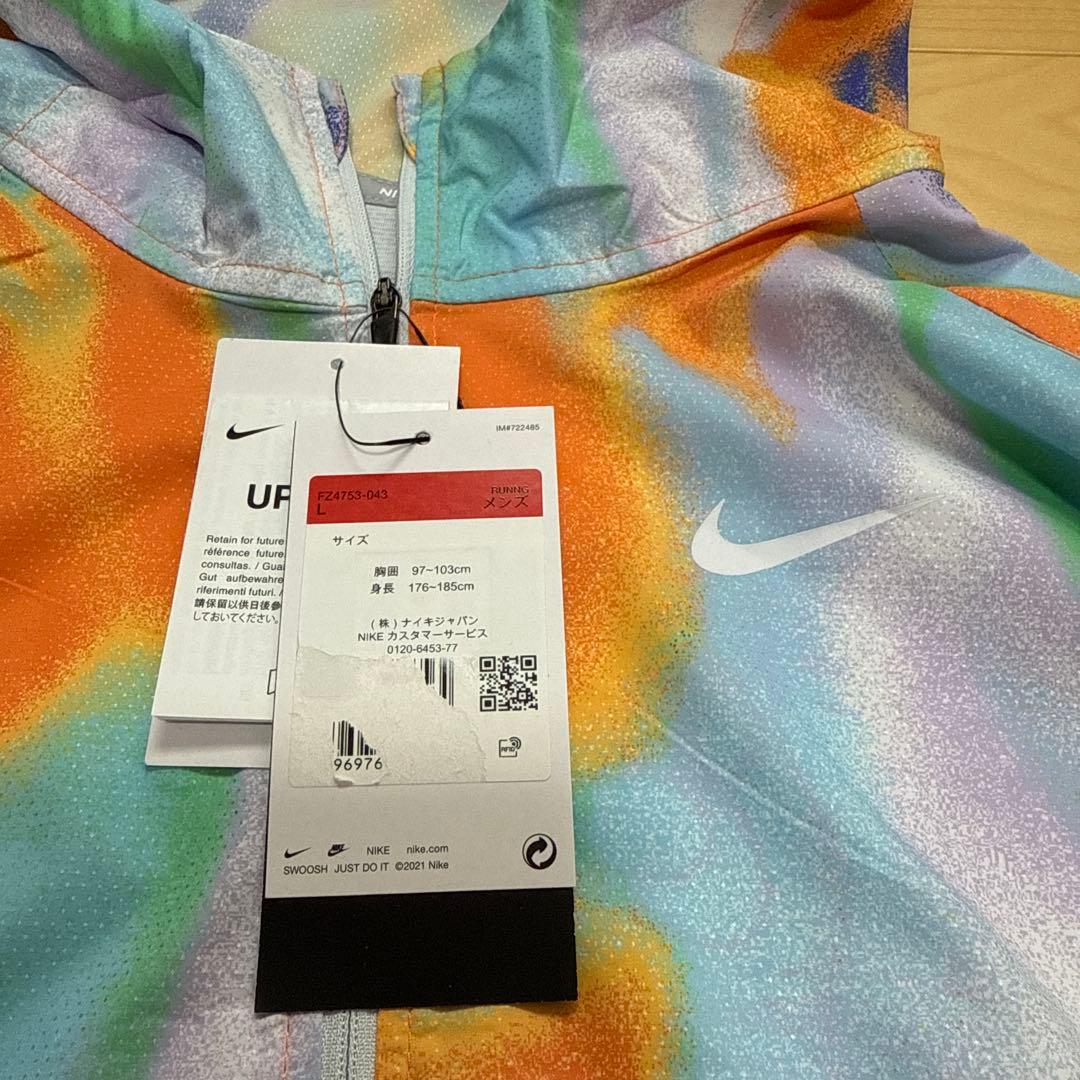 NIKE ランニングウェア　ウィンドランナー　フルジップ　上着　総柄　L 新品